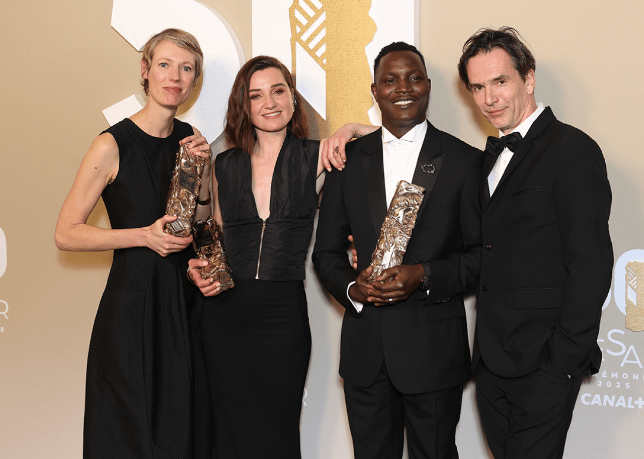 Delphine Agut, Nina Meurisse, Abou Sangare and Boris Lojkine pose in the winners room with their Awards for the movie 